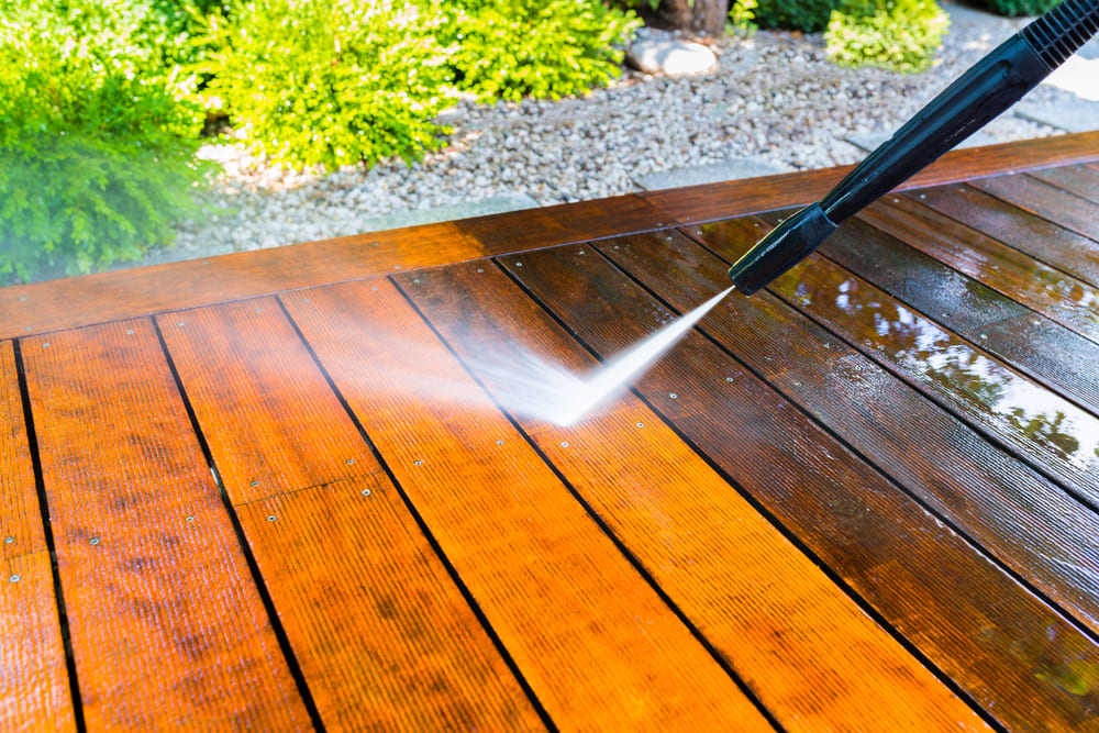 Using a power washer to clean your deck